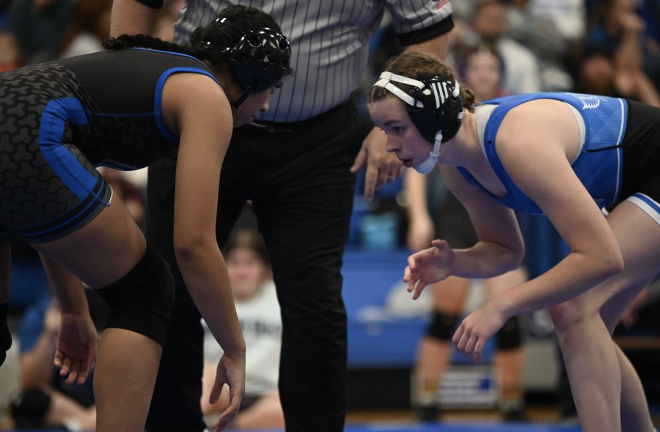 Emma Hood and her opponent getting ready to start their match.